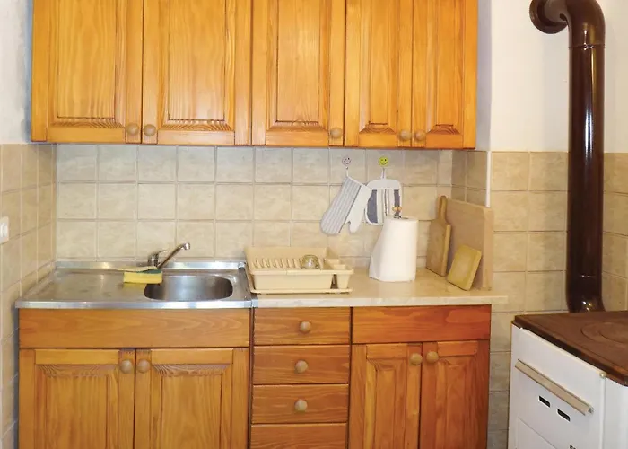 Two-bedroom In Case de vacanță *